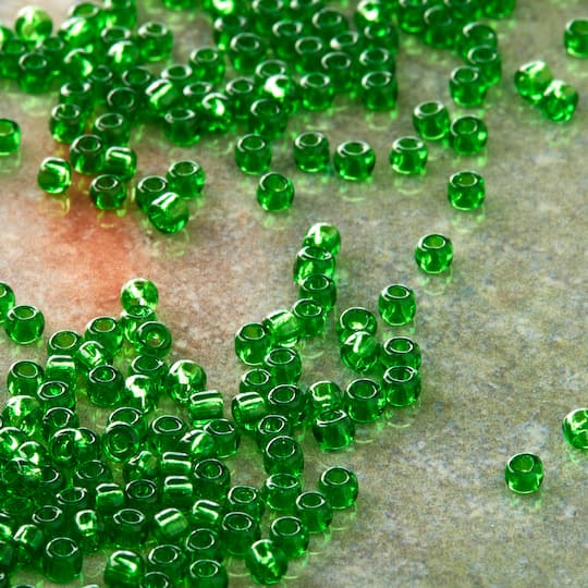 12 Pack: Toho® 11/0 Transparent Green Japanese Glass Seed Beads